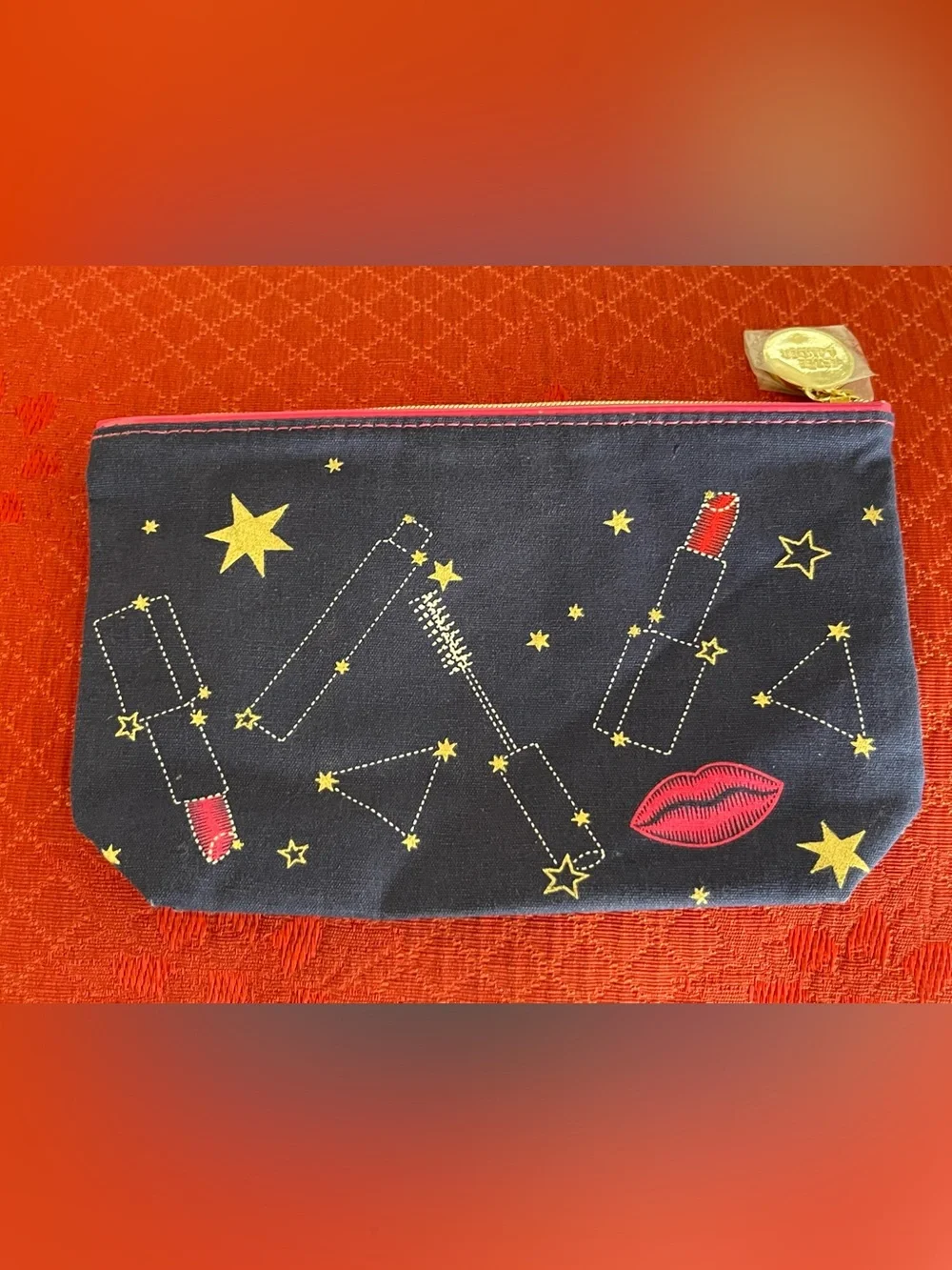 Estee Lauder Navy Cosmetic Pouch with Pink Trim and Yellow Star Print